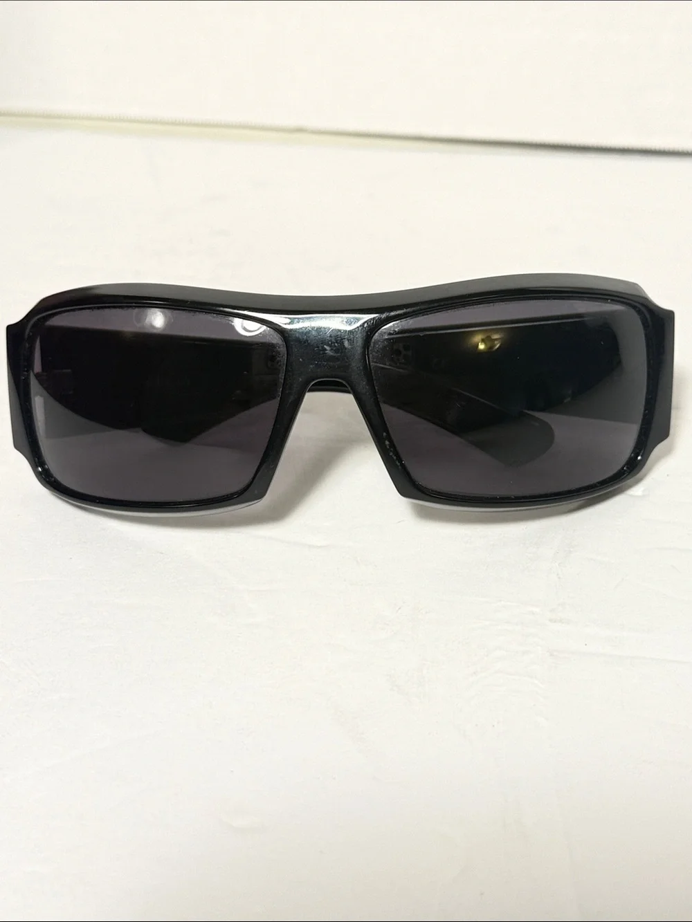 Vintage Gucci Black Sunglasses with Dark Lenses and Logo Temples